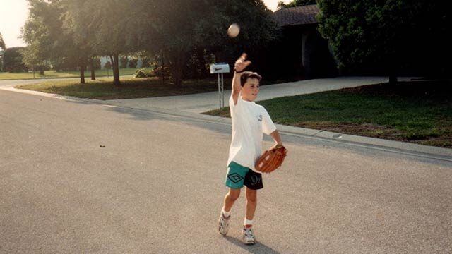 Wesley playing catch as a kid